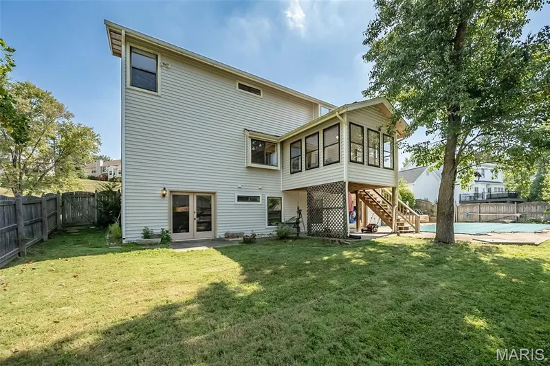 Covered patio under the screened deck — 440 Meramec Way, St Charles, MO 63303