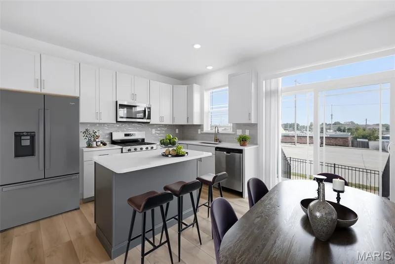 Virtually Staged Kitchen with Upgraded Shaker Style Cabinets — 32 Wingtip Court, St Peters, MO 63376