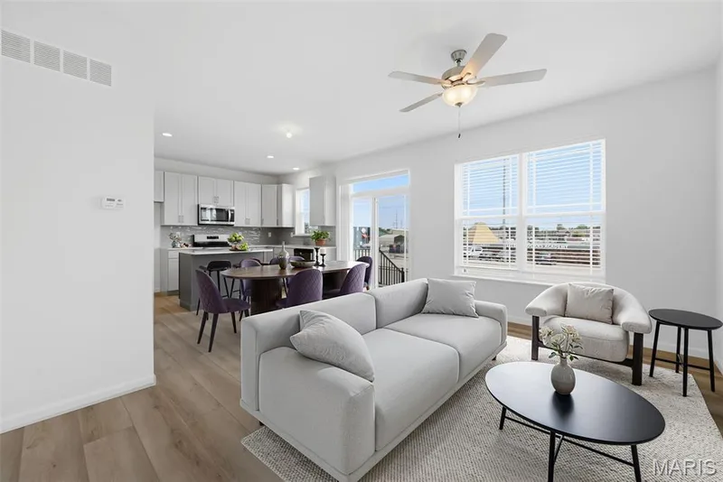 Virtually Staged Family Room open to the Kitchen — 32 Wingtip Court, St Peters, MO 63376