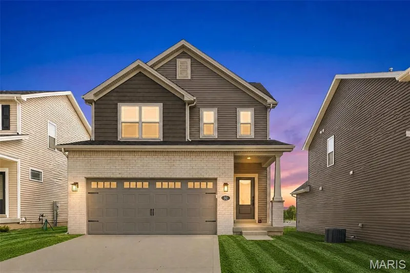 Front of Home at Dusk — 32 Wingtip Court, St Peters, MO 63376