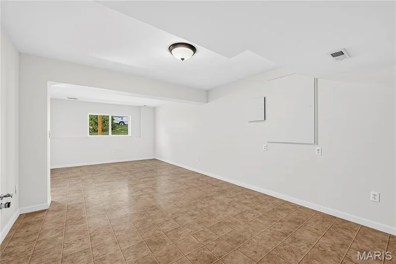 Rec Room in Finished Lower Level — 1700 Coupru Court, St Peters, MO 63376