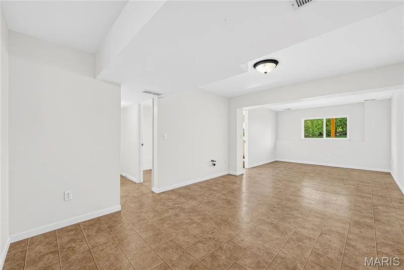 Rec Room in Finished Lower Level — 1700 Coupru Court, St Peters, MO 63376