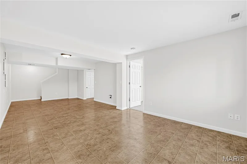 Rec Room in Finished Lower Level — 1700 Coupru Court, St Peters, MO 63376