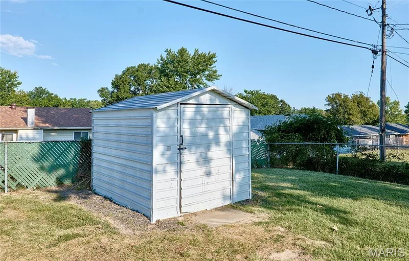 Freestanding storage shed with a gabled roof — 415 Westridge Drive, O'Fallon, MO 63366