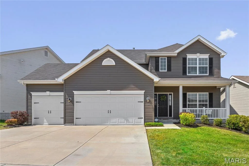 Two-story property with gray siding and white trim — 211 Brookview Way Court, O'Fallon, MO 63366