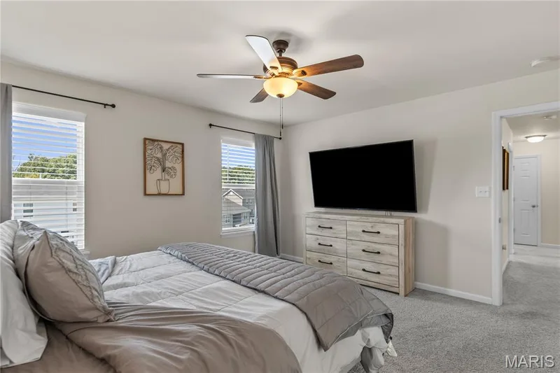 Recessed lighting, ceiling fan, and light gray wall-to-wall carpeting — 211 Brookview Way Court, O'Fallon, MO 63366