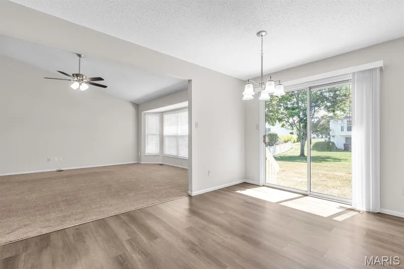 Breakfast room features luxury vinyl plank flooring-2 years old — 882 Sara Beth Court, St Peters, MO 63376