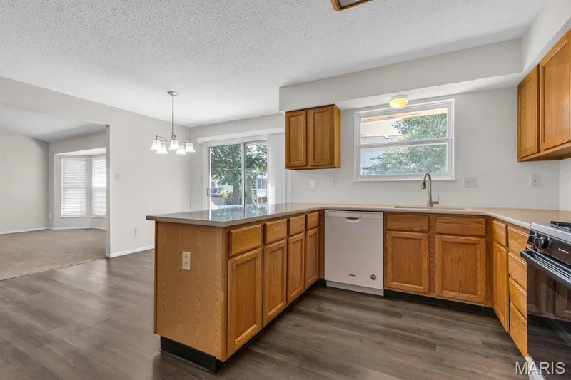 newer luxury vinyl plank flooring. — 882 Sara Beth Court, St Peters, MO 63376