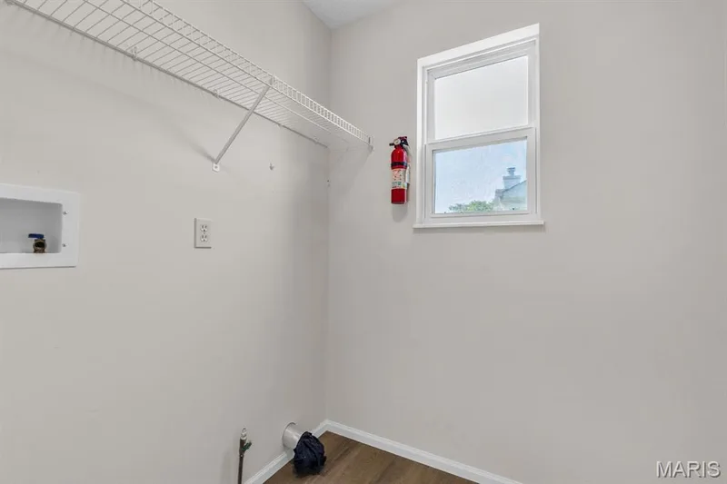 Main floor laundry located just off the kitchen — 882 Sara Beth Court, St Peters, MO 63376