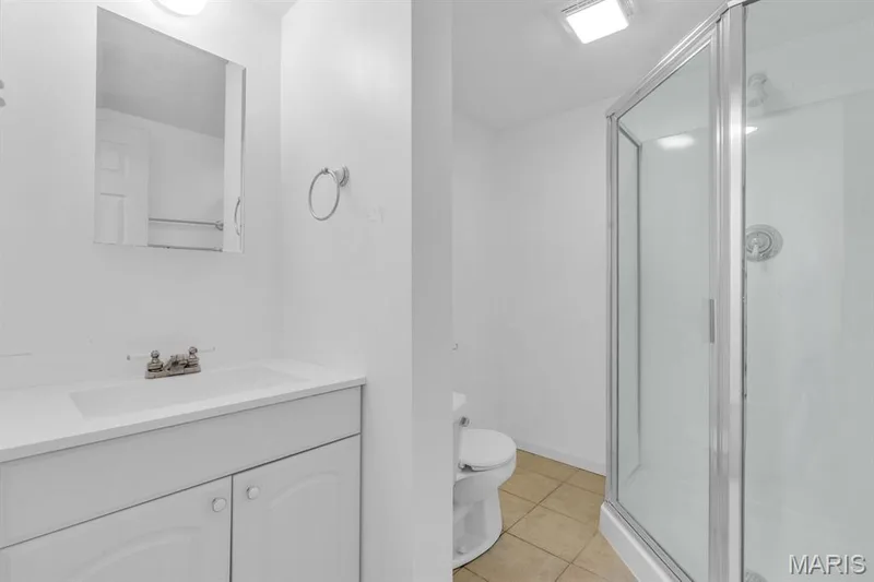 Lower level full bath with new vanity top — 882 Sara Beth Court, St Peters, MO 63376