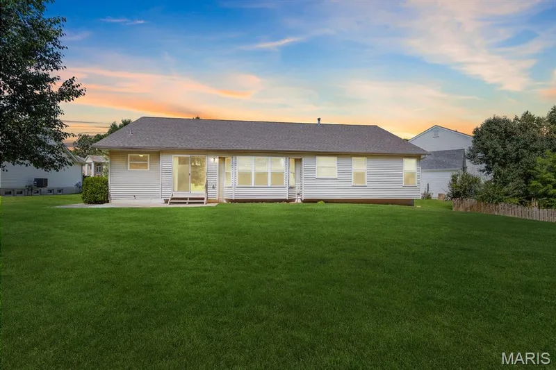 Rear view at twilight — 882 Sara Beth Court, St Peters, MO 63376