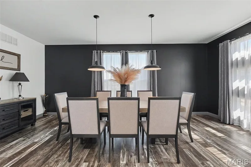 Wood-finish flooring throughout the space — 18 MacArthur Court, St Charles, MO 63304