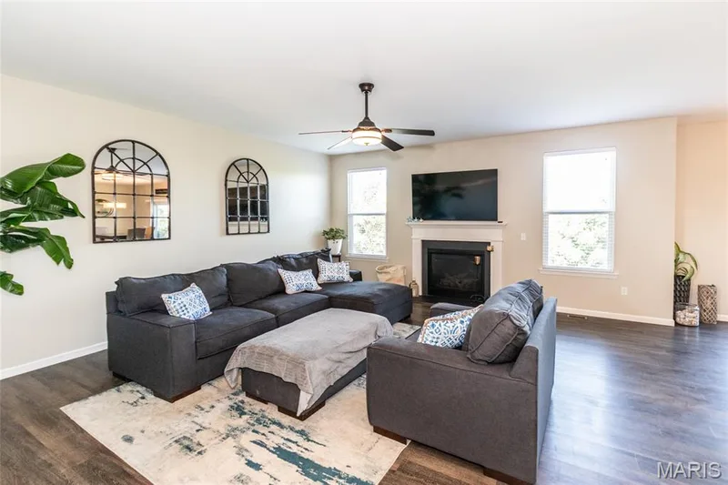 Living area with gas fireplace. — 21 Meadow Vista Court, St Peters, MO 63376