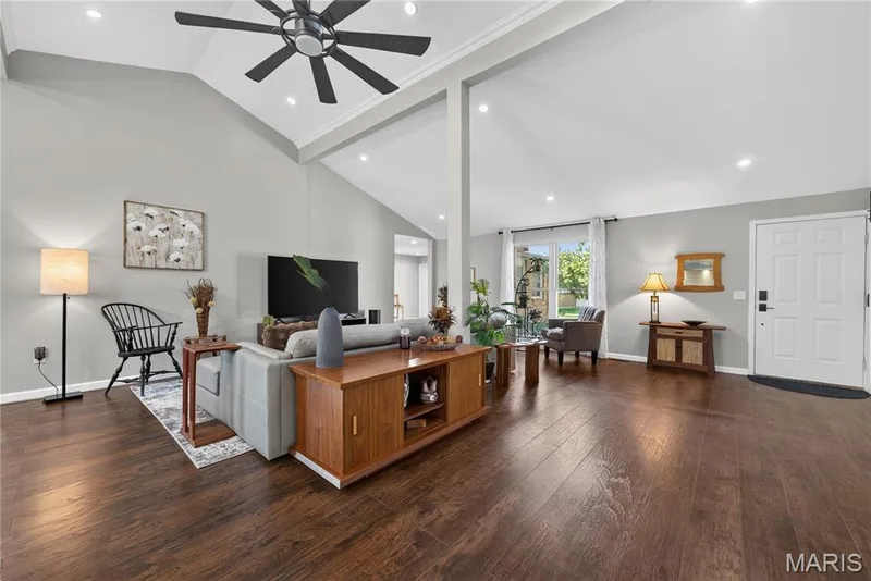 Vaulted great room with skylights and engineered wood floors — 202 Rue Grand Drive, Lake St. Louis, MO 63367