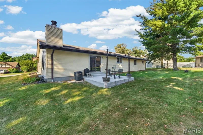 Level yard with patio — 202 Rue Grand Drive, Lake St. Louis, MO 63367