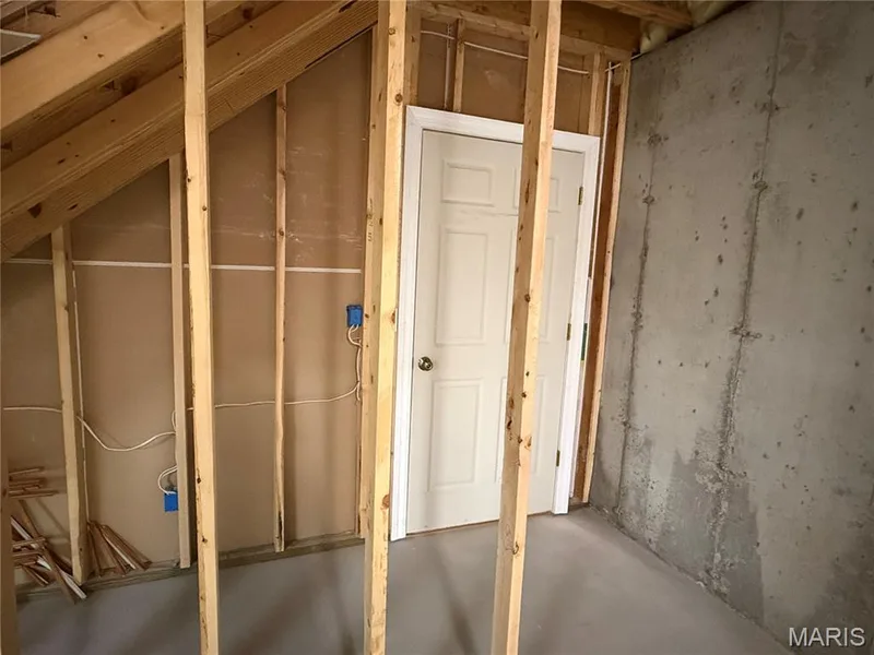 This is where the closet can be completed off of the game room/5th bedroom. there is even a light already installed. — 4412 Augusta Shores Drive, Augusta, MO 63332