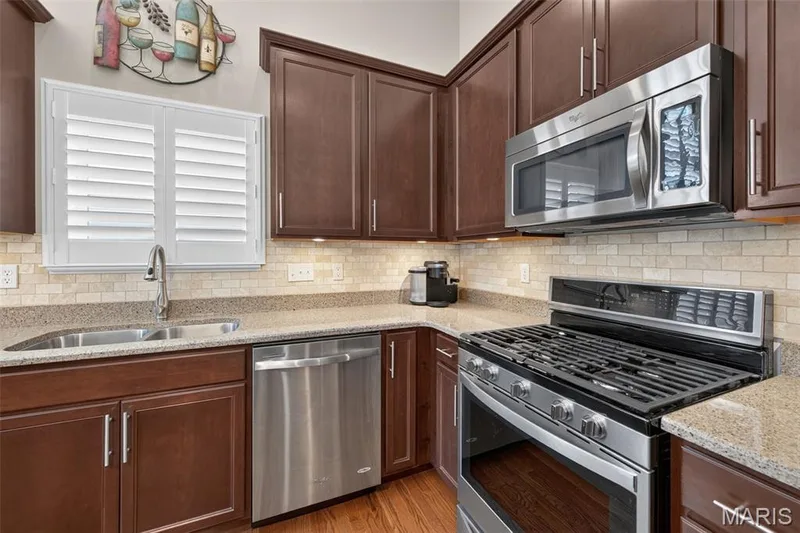 Kitchen with 42" cabinetry & crown — 1052 Silo Bend Drive, Wentzville, MO 63385