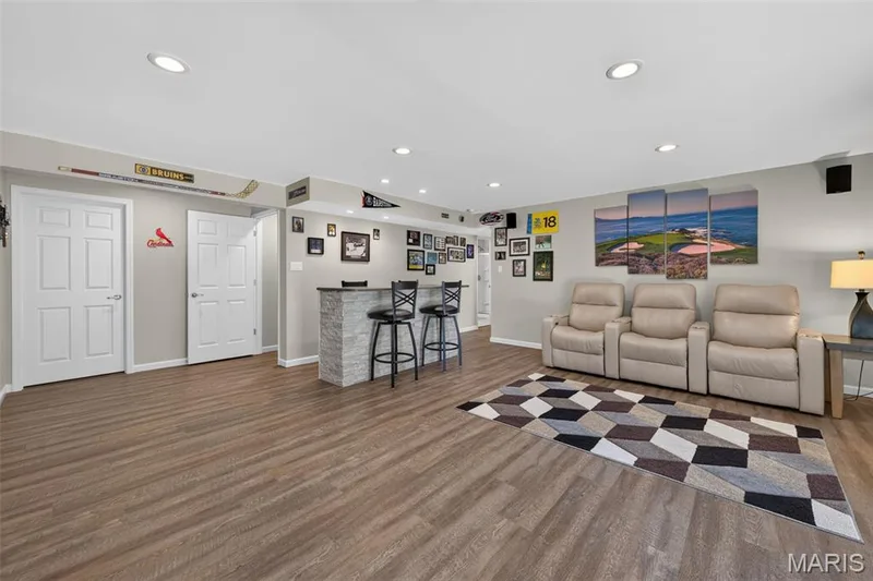 Lower level with bar, cabinetry & sink — 1052 Silo Bend Drive, Wentzville, MO 63385