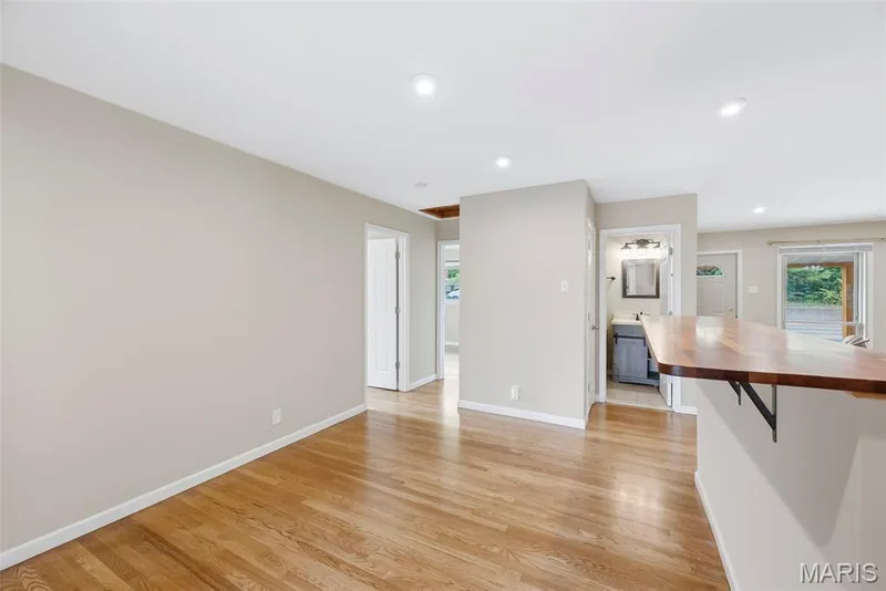 Hearth room off kitchen w/ hardwood — 210 S Duchesne Drive, St Charles, MO 63301