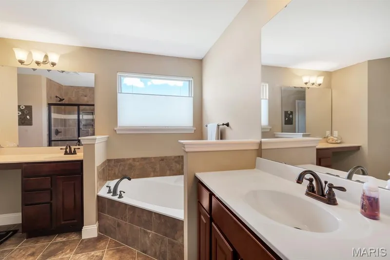 Double Vanity, Two Walk In Closets, Soaking Tub & Sperate Shower — 221 Oakhurst Circle, O'Fallon, MO 63367