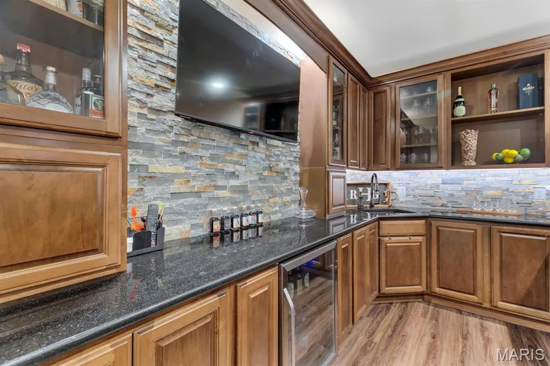 Tiled Backsplash & Ample Cabinet Space — 221 Oakhurst Circle, O'Fallon, MO 63367