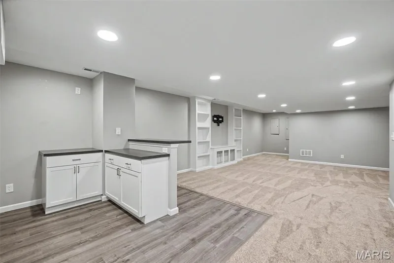recreation room boasts a convenient bar area too. — 152 Carlton Point Drive, Wentzville, MO 63385