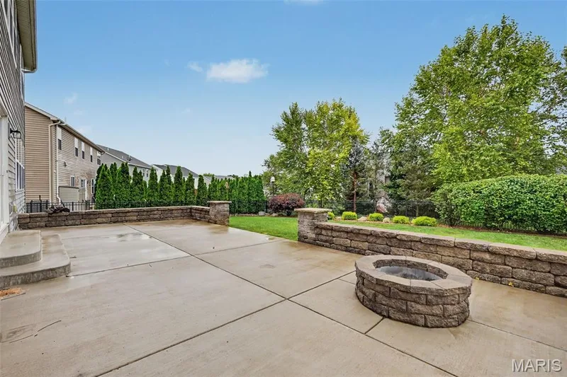 Expanded patio and firepit is a great place to entertain family and friends. — 152 Carlton Point Drive, Wentzville, MO 63385