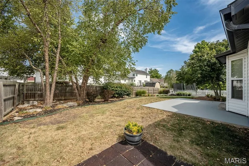 Fenced and well landscaped back yard — 2007 Trio Drive, Wentzville, MO 63385