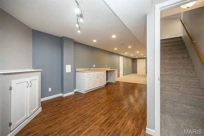 Finished lower has TWO SLEEPING ROOMS and a full bathroom — 2007 Trio Drive, Wentzville, MO 63385