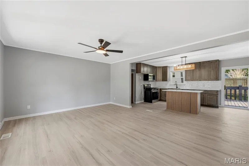 Great room opens to kitchen — 2916 Thrush Drive, St Charles, MO 63301