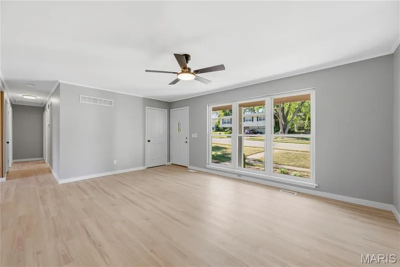 Great room leading down hall — 2916 Thrush Drive, St Charles, MO 63301
