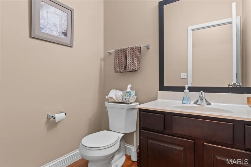Main level guest powder bath. — 35 W Hampton Ridge Court, Wentzville, MO 63385