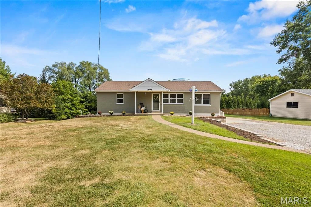 Cozy brick ranch charm on 1/2 acre of peaceful practical living. — 1808 Cherry Tree Street, St Peters, MO 63376