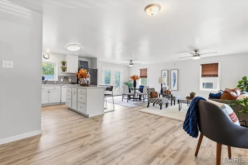 Sunlight, open spaces, and seamless flow—designed to bring the outside in. — 1808 Cherry Tree Street, St Peters, MO 63376