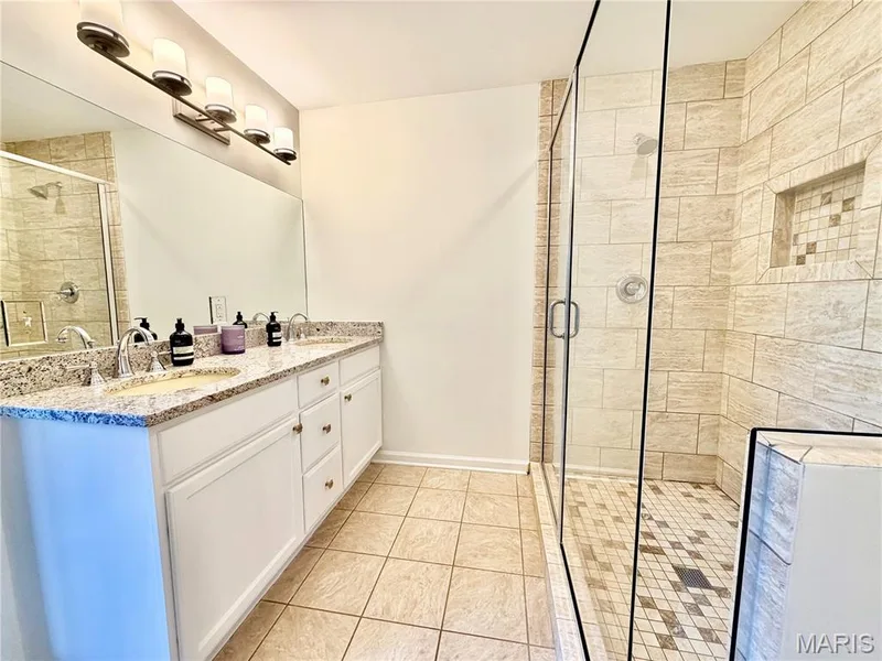 Double vanity with granite countertop and undermount sinks — 584 Sunbridge Drive, Chesterfield, MO 63017