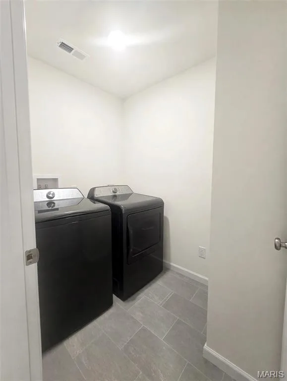 Recessed lighting, tile flooring, and white walls — 157 Day Lily Lane, Wentzville, MO 63385