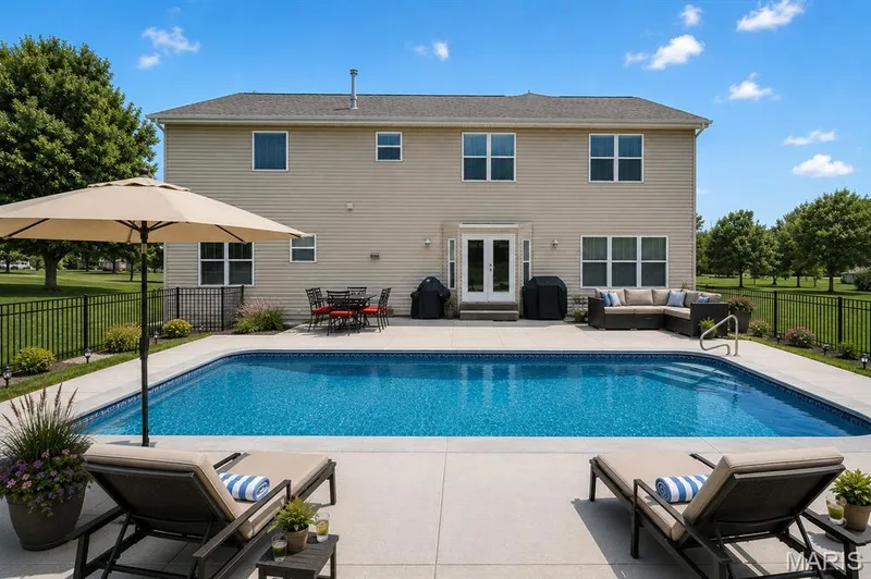 AI generated pool to show size of backyard and seller had done a pool fit. — 103 Mackintosh Lane, O'Fallon, MO 63368