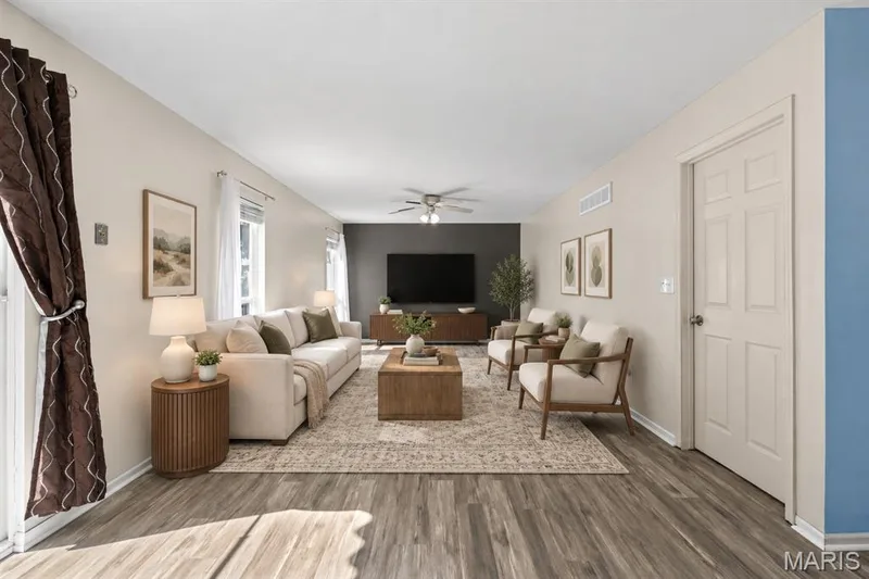 virtually staged living room — 204 Boulder Point Drive, St Peters, MO 63376