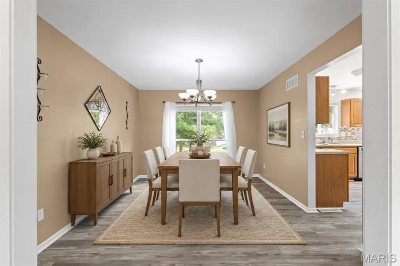 virtually staged dining area — 204 Boulder Point Drive, St Peters, MO 63376