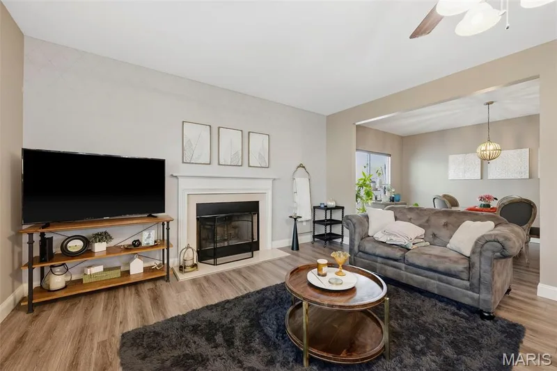 Living room opens to dining room — 513 Country Chase Drive, Lake St. Louis, MO 63367