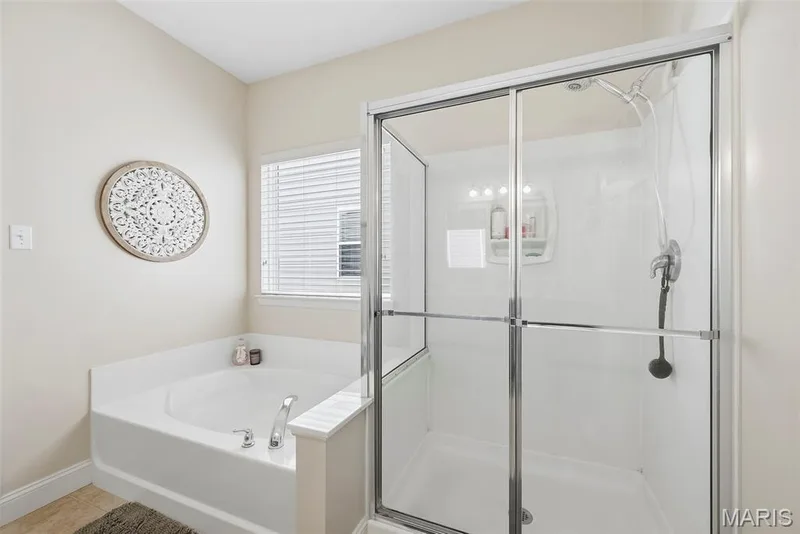 Separate soaking tub and shower — 513 Country Chase Drive, Lake St. Louis, MO 63367