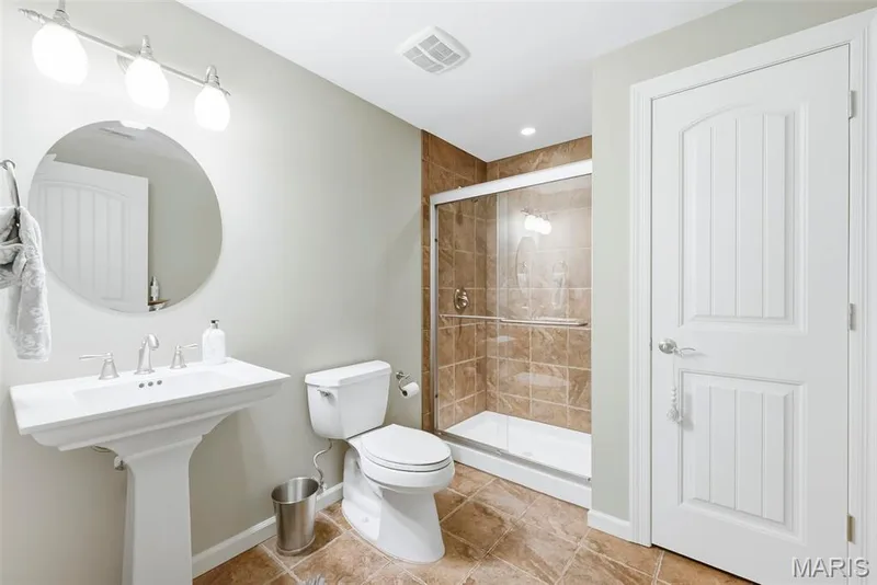 Lower level bathroom — 513 Country Chase Drive, Lake St. Louis, MO 63367