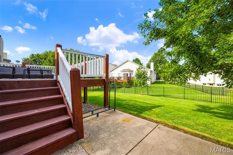 Step down to the patio — 513 Country Chase Drive, Lake St. Louis, MO 63367