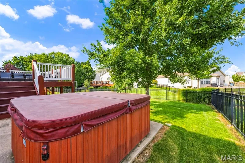 Unwind with your hot tub that stays with the home — 513 Country Chase Drive, Lake St. Louis, MO 63367