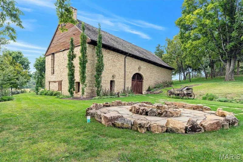 Great fire pit area leading to the custom stable — 2275 Highway F, Defiance, MO 63341