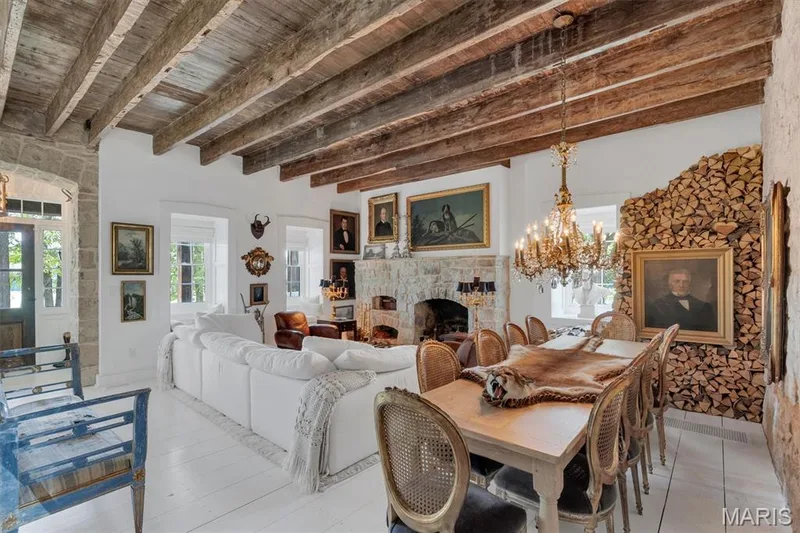 Exposed wood beam ceiling, stone fireplace, and wood-finish flooring — 2275 Highway F, Defiance, MO 63341