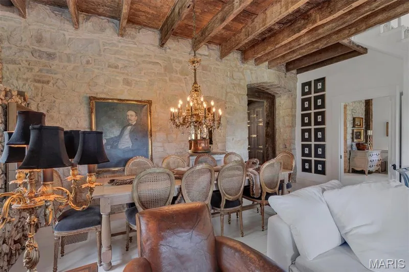 Exposed stone walls with rough-hewn wood ceiling beams — 2275 Highway F, Defiance, MO 63341