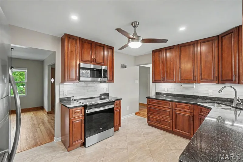 Counter space galore! Multiple cooks (or mini cooks) will fit in this kitchen! — 502 Pine Street, St Charles, MO 63301