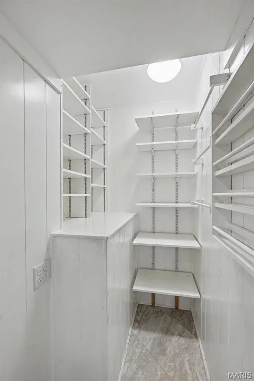 Built-in pantry space with adjustabe shelving to accomodate food items as well as small appliances. — 502 Pine Street, St Charles, MO 63301