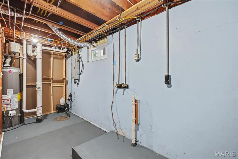 Hot water tank, washer/dryer hook up in back storage area. — 502 Pine Street, St Charles, MO 63301